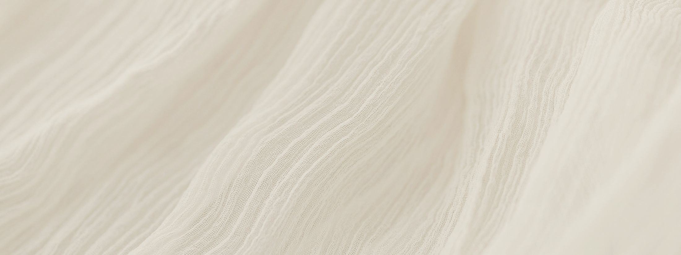 Textured beige fabric background.