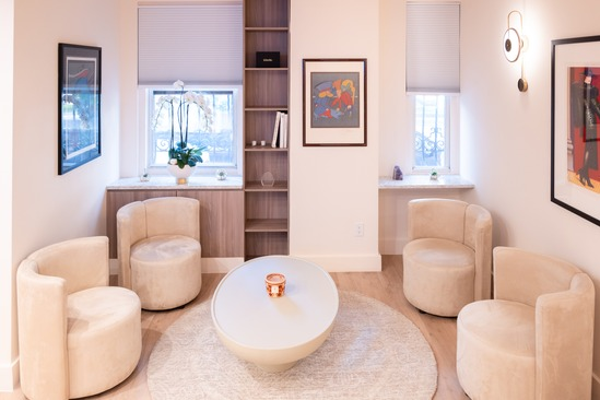 Cozy modern living room with soft seating.